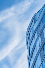 Poster - A plane flying in the air near a building