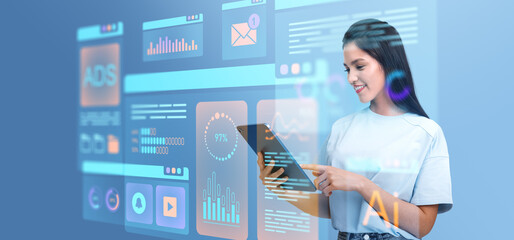 Fototapete - Woman interacting with virtual data interface on tablet, futuris
