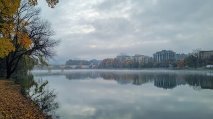 Aufkleber - Serene River Landscape on a Foggy Overcast Day with Autumn Foliage and Reflections