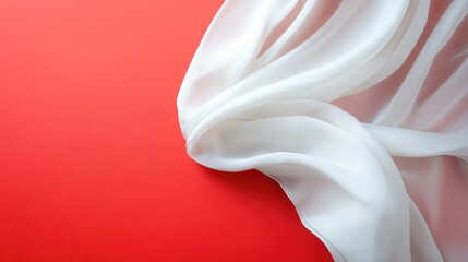 Fototapete - Elegant white sheer fabric gracefully flowing over a bold red background creating a striking visual contrast for creative design projects