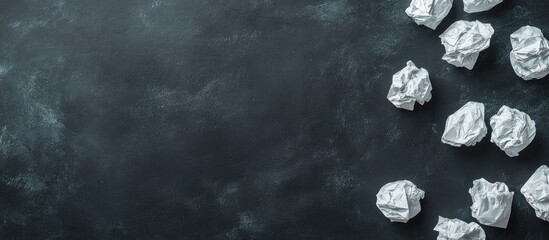 Poster - Text space over black chalkboard background with scattered crumpled paper balls for creative writing or brainstorming concepts