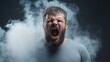 © khonkangrua - Intense Male Expression of Anger Surrounded by Dramatic Smoke in Dark Setting with Strong Contrast and Emotions