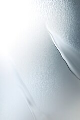 Poster - frosted metallic texture with glowing edges on a smooth silver gradient background creating a calmin