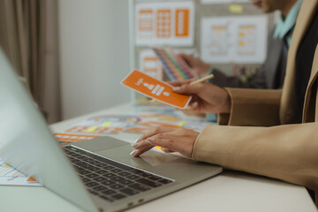 the web design team is consulting to exchange ideas on how to develop digital products, a team of we
