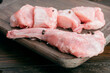 © ADDICTIVE STOCK - Fresh raw rabbit meat on wooden board with pepper seasoning