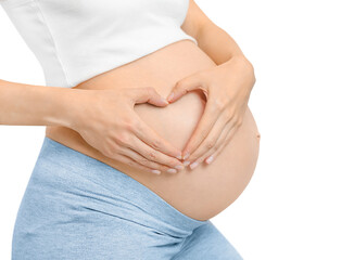 pregnant woman folded her hands in a heart shape near her belly. concept of love, care and family. isolated on white background