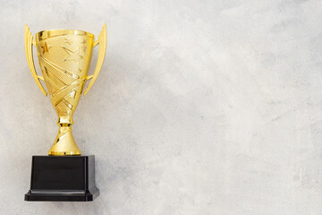 champion golden trophy cup. success and victory concept