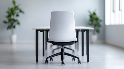 Poster - White office chair in front of empty desk representing remote work and flexible working hours