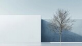 A stark bare tree stands adjacent to a minimalist wall under a clear sky, creating an atmosphere of solitude and reflection, encapsulating nudity and structure.