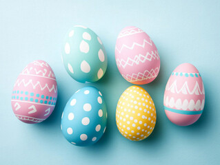 Colorful easter eggs display studio setting photography bright blue background overhead angle festive traditions