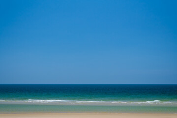 Wall Mural - beautiful seascape with blue sky on a sunny day. nature background. sea surface in sun light. relaxi