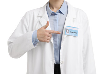 Wall Mural - Doctor pointing at her badge on white background, closeup