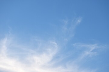 Wall Mural - cloud spreading on bright sky in sunny day