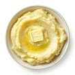 © Jorda - A bowl of creamy mashed potatoes with a pat of butter melting on top, isolated white background, hyperrealism art style