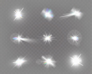 Wall Mural - set of glowing light effects with starbursts and radiating beams on a transparent background, ideal 