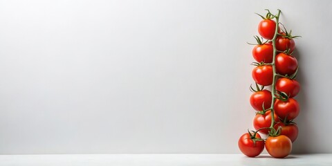 Poster - A vibrant bunch of ripe red cherry tomatoes on the vine against a simple white background