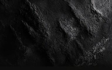 Poster - a textured black surface with rugged patterns, ideal for backgrounds, design projects, and artistic 