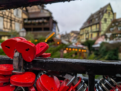 Heart shape locks on a railing in Colmar