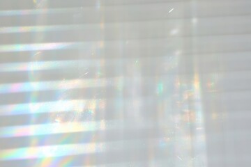 Poster - Abstract light reflections create a vibrant pattern on a textured surface, adding a dreamy visual effect.