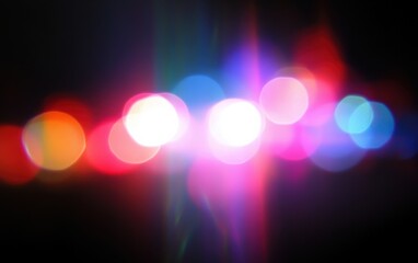 Poster - abstract blurred lights in red, blue, and white create a vibrant background with a surreal atmospher