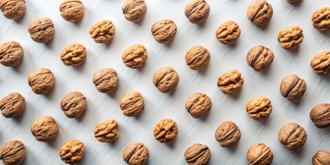 Poster - Organized arrangement of shelled walnuts on a light surface