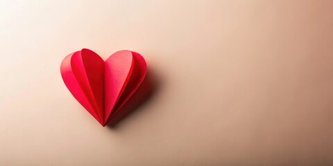 Poster - A delicate red paper heart, meticulously folded, rests on a soft beige background, conveying a message of affection and heartfelt emotion.