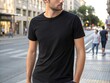 © MIkrom - Casual Man in Black T-Shirt on City Street