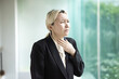 © 9nong - sick business woman having sore throat, coughing or choking with sickness or flu inflammatory infection
