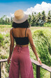 © BullRun - Unrecognizable female traveler enjoying tropical landscape