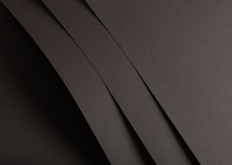 Poster - Charcoal gray paper background with matte, overlapping layers and subtle shadows. The textured gradient design creates a bold, refined, and versatile composition with a modern, artistic style.