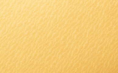 Golden yellow paper background with rippled, wavy textures and a smooth surface. Vibrant warm tones and a bold, polished design create a refined, luxurious, and dynamic composition.