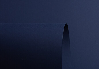 Poster - Midnight blue paper background with curved, matte surfaces and a smooth, grainy texture. Bold dark tones and a polished design create a dynamic, stylish, and refined composition.