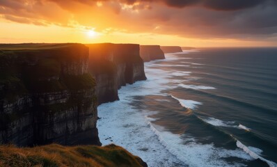 Wall Mural - Stunning sunset over rugged cliffs