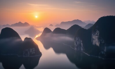 Wall Mural - Breathtaking sunrise over misty mountains