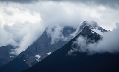 Wall Mural - Majestic mountains shrouded in clouds