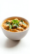 © Alex - Delicious bowl of creamy chicken curry garnished with fresh herbs, perfect for showcasing culinary delights.