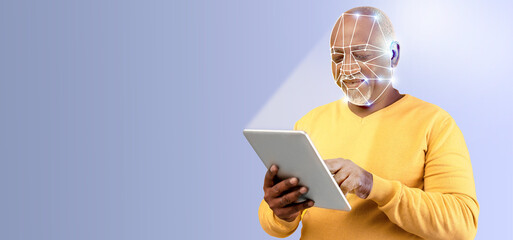 Poster - A man with a thoughtful expression interacts with a tablet, utilizing facial recognition technology. The setting features a clean, isolated background with ample copy space, emphasizing the activity.
