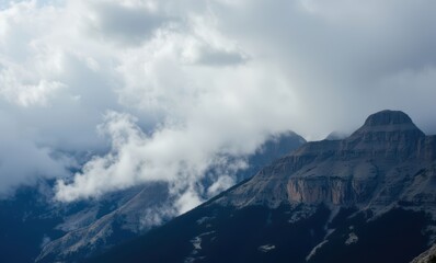 Wall Mural - Misty mountain landscape with dramatic clouds