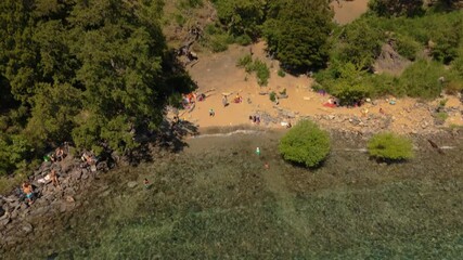 Wall Mural - Aerial footage of the La Islita beach on a sunny day in San Martin de los Andes city, Argentina