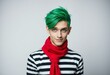 © iushakovsky - Male portrait with bright green hair and a playful expression