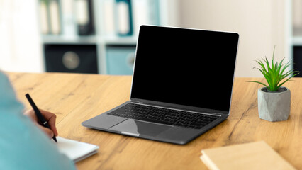 Aufkleber - Young man having virtual meeting with his Arab colleague, using laptop computer to communicate online at office. Millennial guy participating in online video conference with his coworker