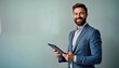 © Pete - Confident man in suit holds tablet. Smiling pro agent stands against light background. Business person, tech savvy insurance sales person. Modern office worker. Commercial, company, personal photo.