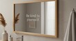 © ufuk - This image shows a bathroom mirror with the text Be kind to yourself reflected in it.
