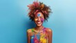 © sergiokat - Colored girl laughs at the Holi festival. Sunny Day