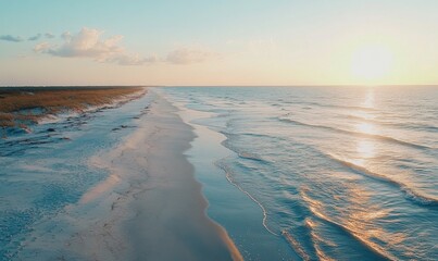 Wall Mural - A serene beach scene with a vast expanse of blue ocean and soft white sand at sunset, sea, peaceful, nature, twilight