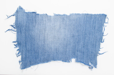 Wall Mural - jeans. a frayed and torn piece of denim rag