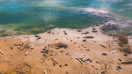 Wall Mural - Thermal hot lake in rotorua new zealand sunny day steam bubbles contrast colours