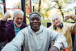 © Marko Geber - Diverse senior men taking selfie while working out in park