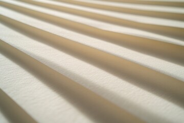 Leinwandbilder - Textured background featuring soft light and shadow patterns in warm beige tones creates an inviting atmosphere for product photography purposes