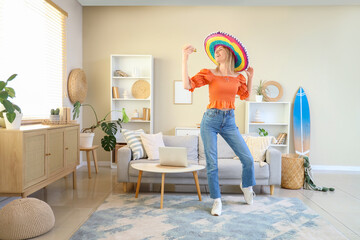 Sticker - Young woman in sombrero hat with tasty taco dancing at home